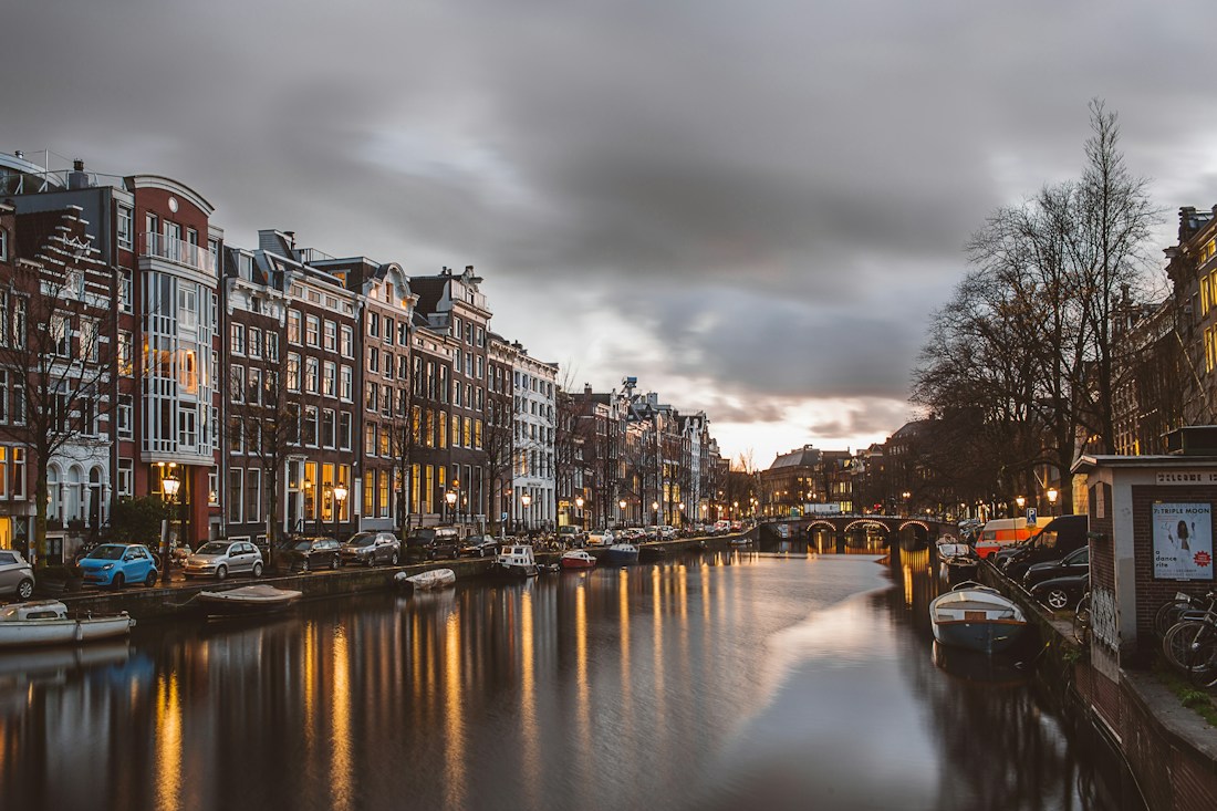 Amsterdam canal and traditional Netherlands buildings